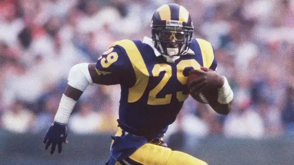 NFL Play Calling:  Eric Dickerson is one of eight running backs to have gained over 2,000 yards in a single season.  